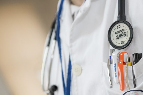 Close up of a stethoscope around a doctor's neck