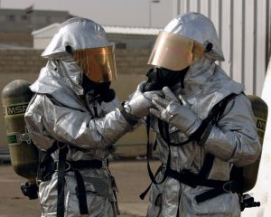 Fire fighters in their silver protective clothing