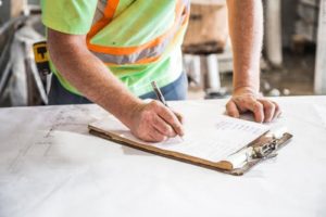 builder signing a form